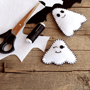 8-kid-friendly-halloween-crafts-ghost-puppets.png
