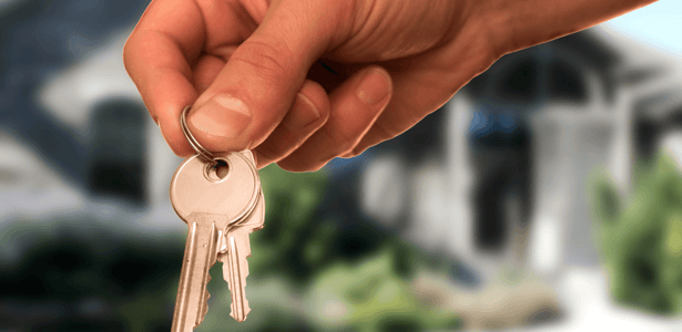 pros-cons-becoming-landlord-hand-holding-keys-featured-image.png